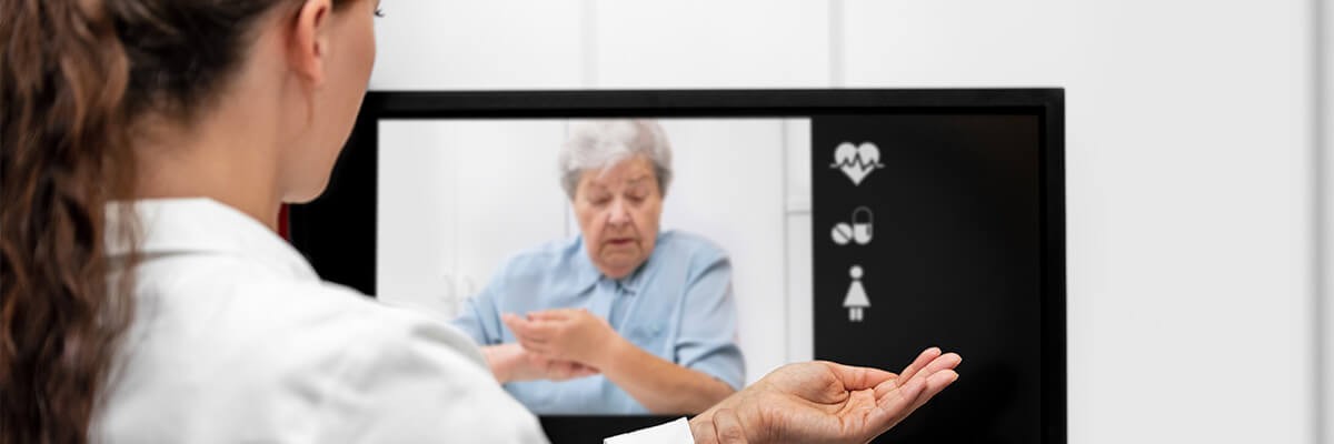 Teledoctor explaining telemedicine healthcare procedures with patent remotely. 