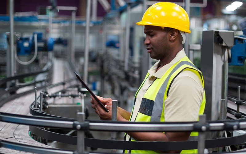Manufacturer reviewing info securely over SD-WAN network.