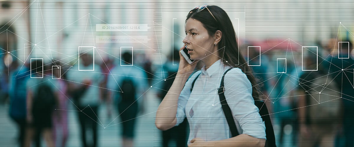 Woman holding computer smartphone device to ear 