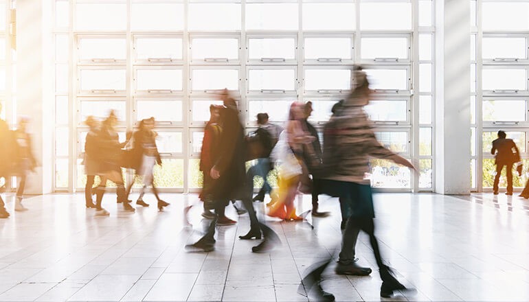 Large group of individuals walking. Contact tracing webinar, digital contact tracing tools, contact tracing for business, return to work