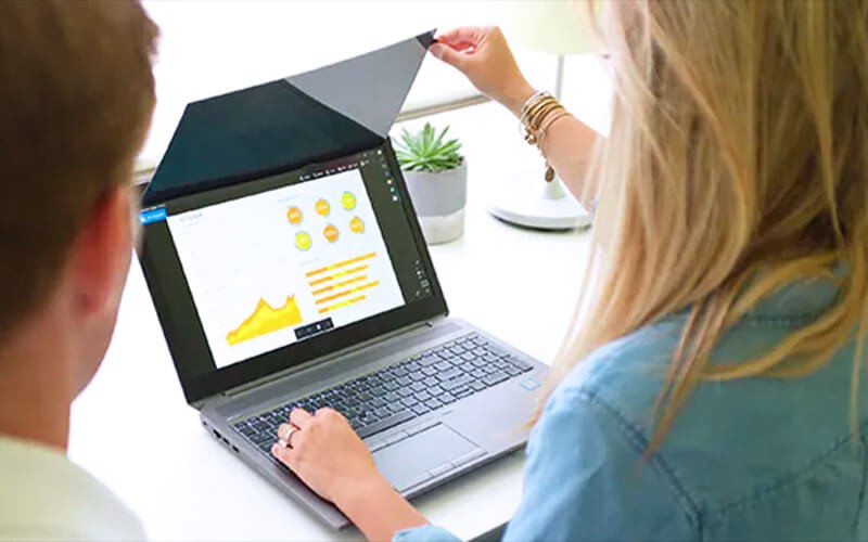 COMPLY laptop privacy screens Woman on laptop using flip attached filter