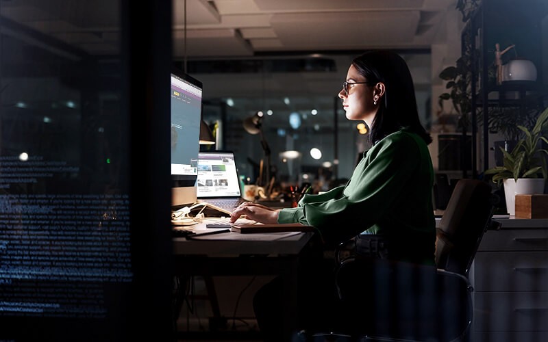 Email threat protection Corporate woman working late at night