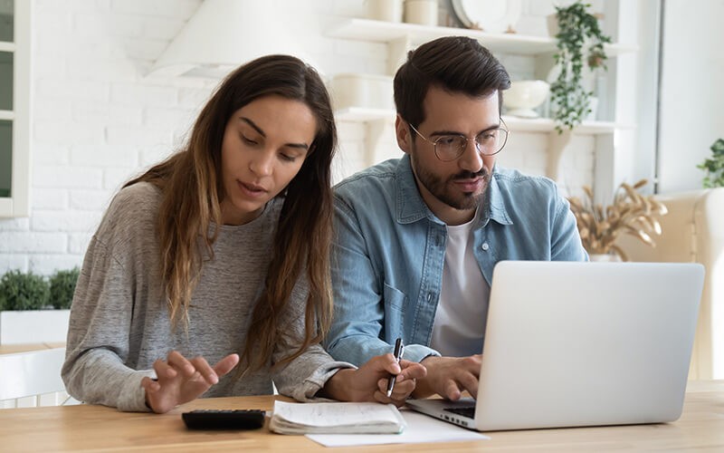 Keep your enterprise safe. Teammates working together using a laptop
