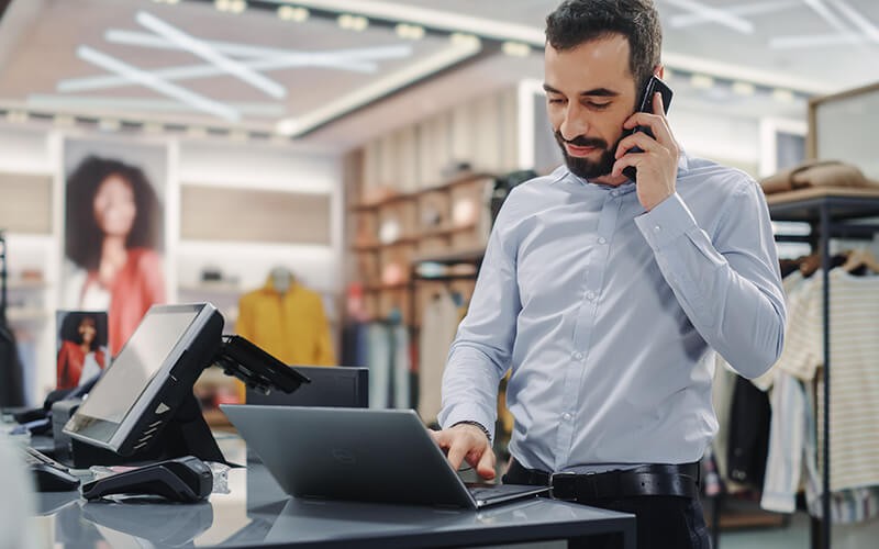 IoT, AI and edge technology Man calling using his phone