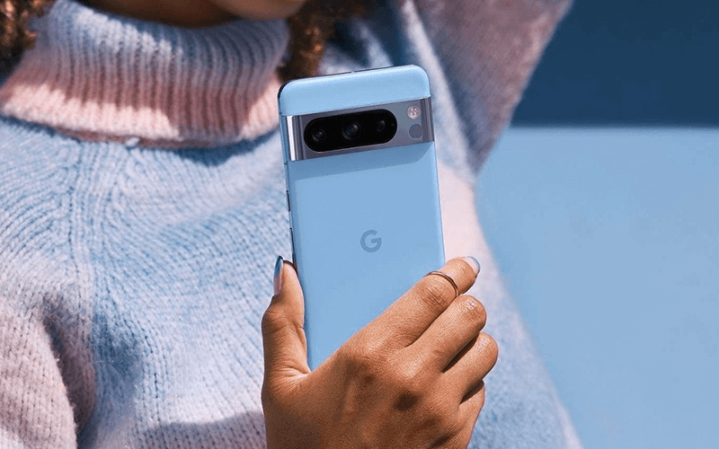 Better management means more productivity. Woman holding a Pixel phone