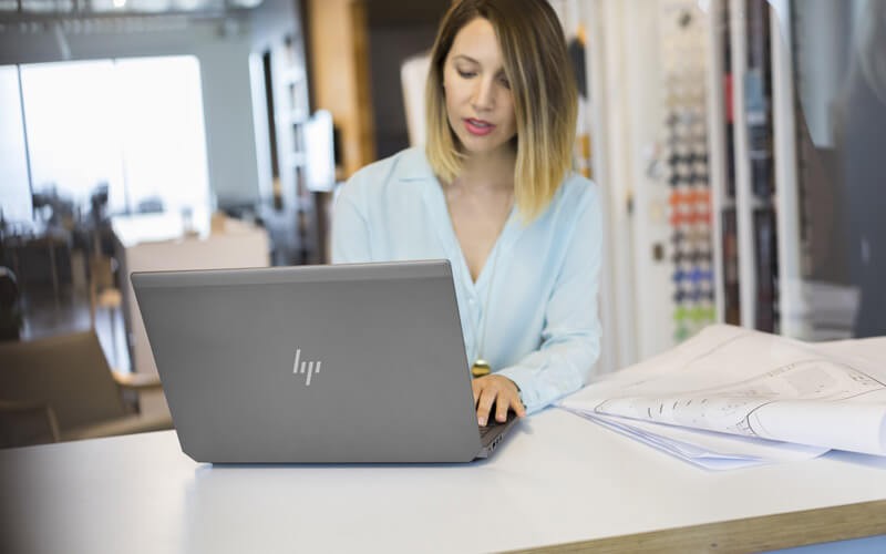 HP Zbook mobile workstations Woman working using a HP laptop