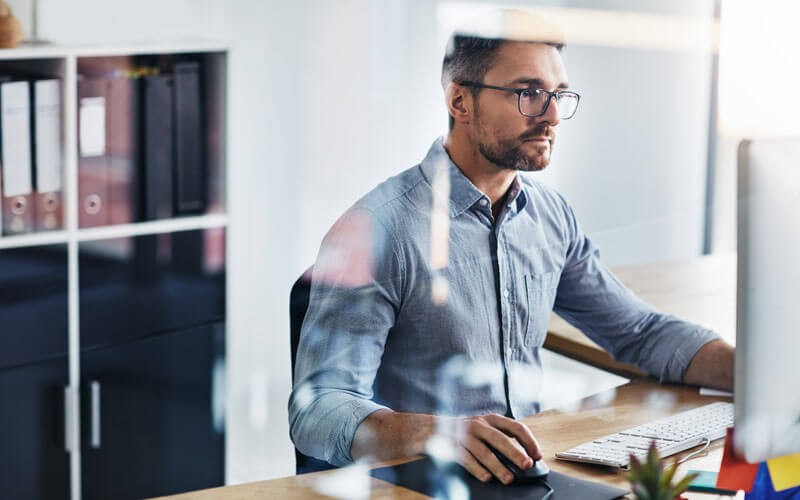 IBM Cognos explores your data Man using computer