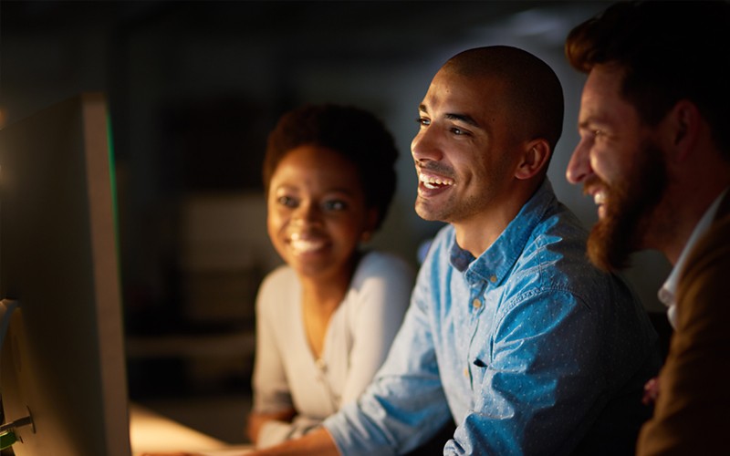Integrated Analytics System Three users working together