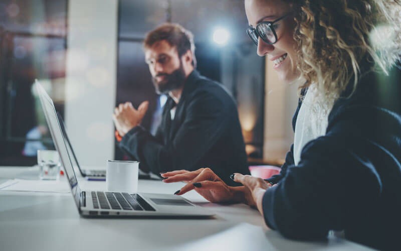 Implement in the cloud or on premises Business man working on tablet computer