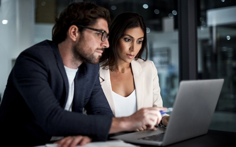 Watson Customer Engagement software suite Two people collaborating at computer