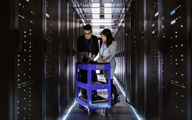 IBM analytics software Two users in server room