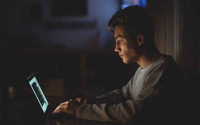 Better endpoint management Man working using a laptop at the home