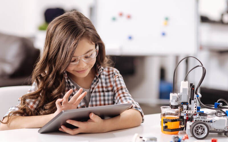 Image API Paperless Education is powered by Axiom Digital Library or Axiom Pro Student working on tablet device