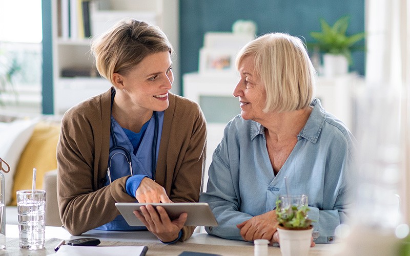 Healthcare-specific solutions from Insight and Jamf transform care delivery and streamline communications for providers and patients alike. Doctor talking to patient