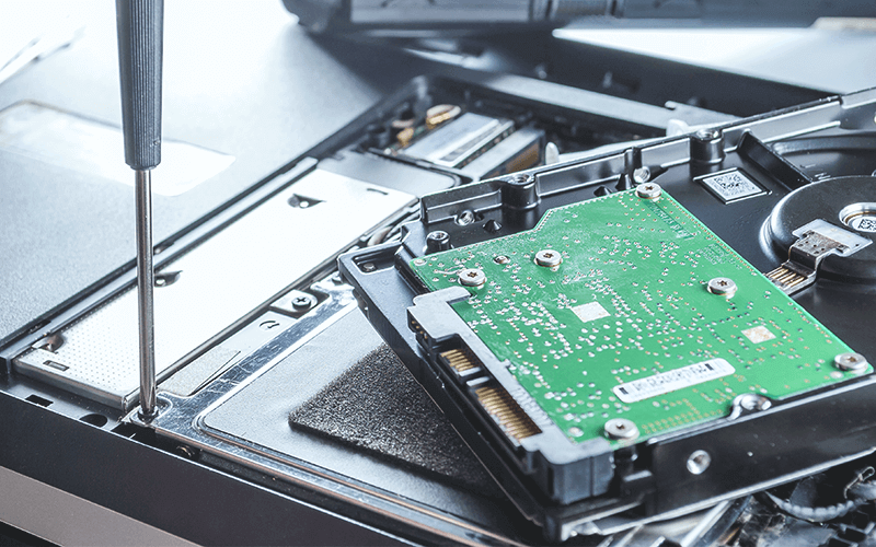 Man fixing laptop
