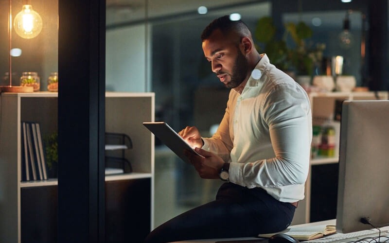 Man using tablet device