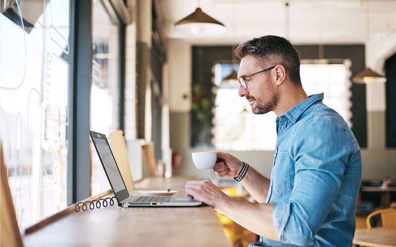 Next-level device security Professional using a laptop