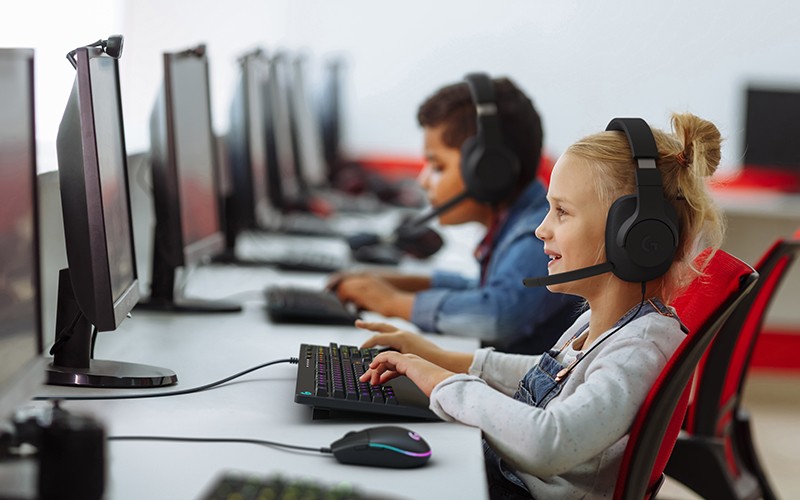 A happy kid palying games