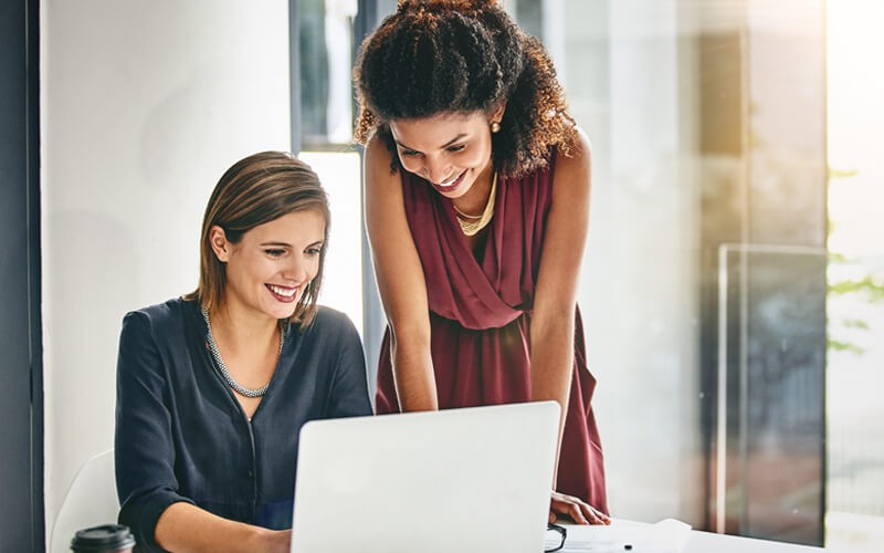 Gain insights into digital workflow adoption and pinpoint print-reduction opportunities Two women collaborating