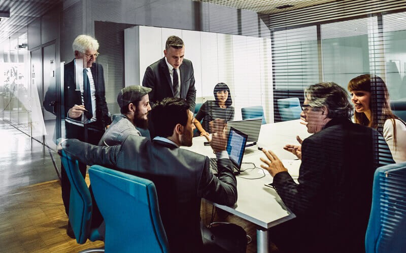 ZeroIMPACT data protection from Quest Group of businessman working