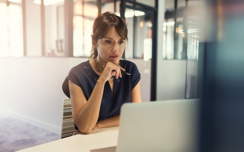Red Hat Certified Cloud and Service Provider Program Woman on computer