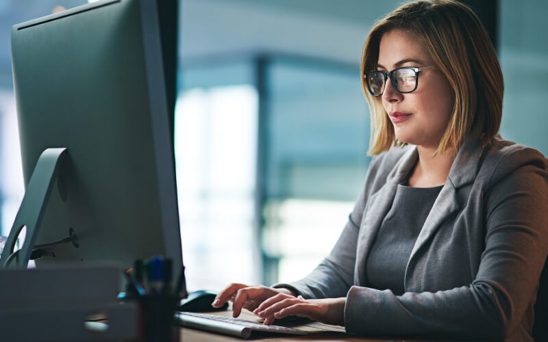 Endpoint security Woman using her devices at work