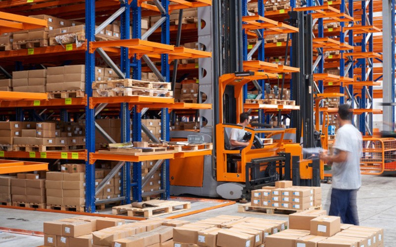 Industrial sites bring challenges that put your IT assets at risk Worker on a warehouse factory