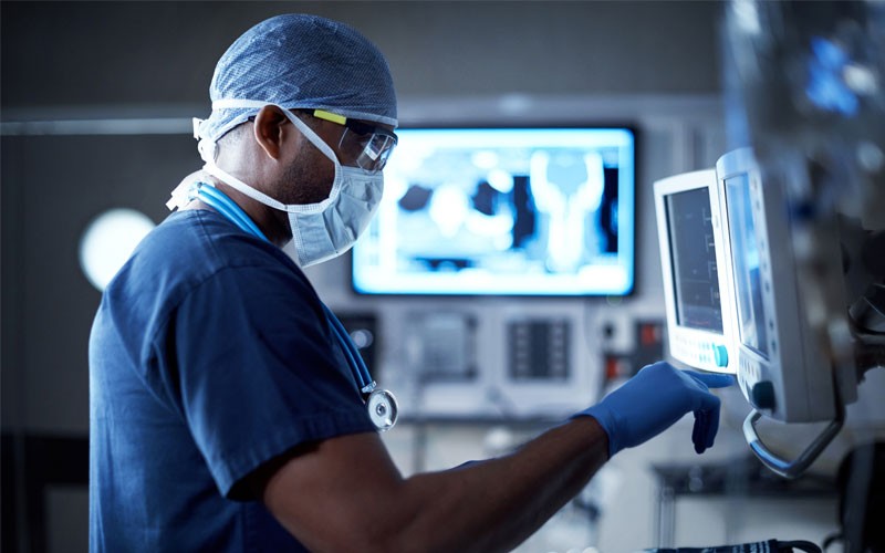 IT teams in healthcare strive to deliver the best patient care Doctor using healthcare technology
