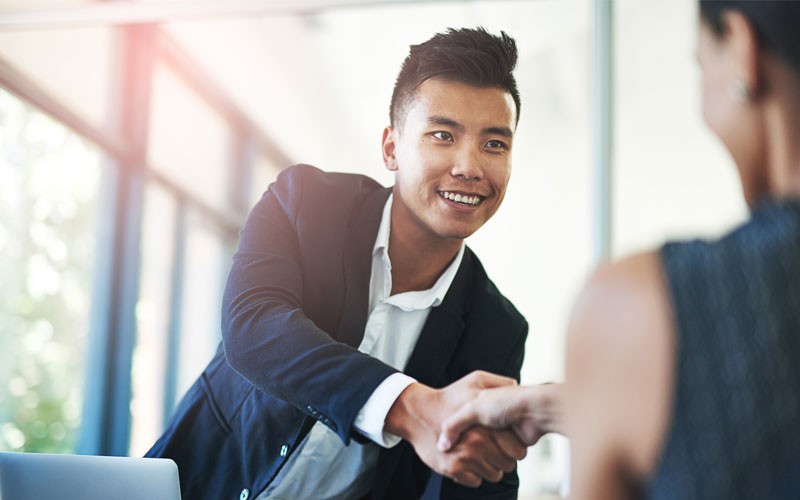 Service provider solutions Business man reaching out for handshake