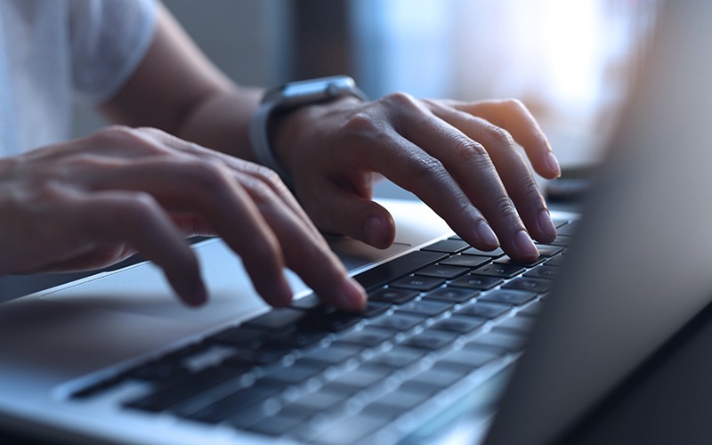 Get more done with orchestration for your applications, workloads and tasks. Professional working on laptop