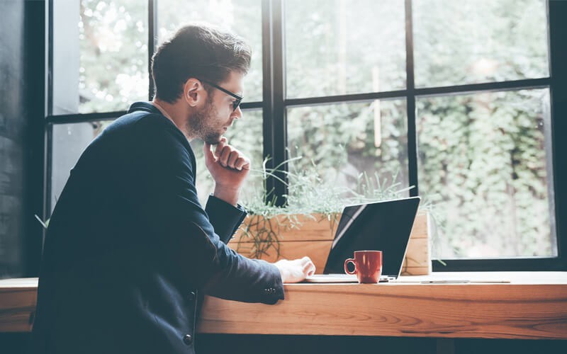 WatchGuard offers Endpoint security A man working using his laptop