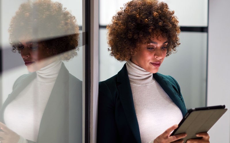 Protect all the technology used by your remote workers Businesswoman using tablet device