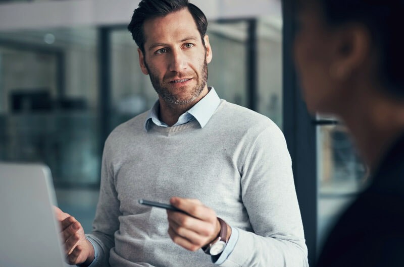 We’ll help you understand each application’s dependencies Businessman on laptop computer using application discovery tools