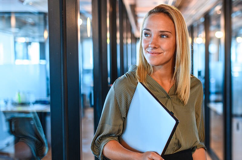 Contracts Reporting View Business professional walking through modern office