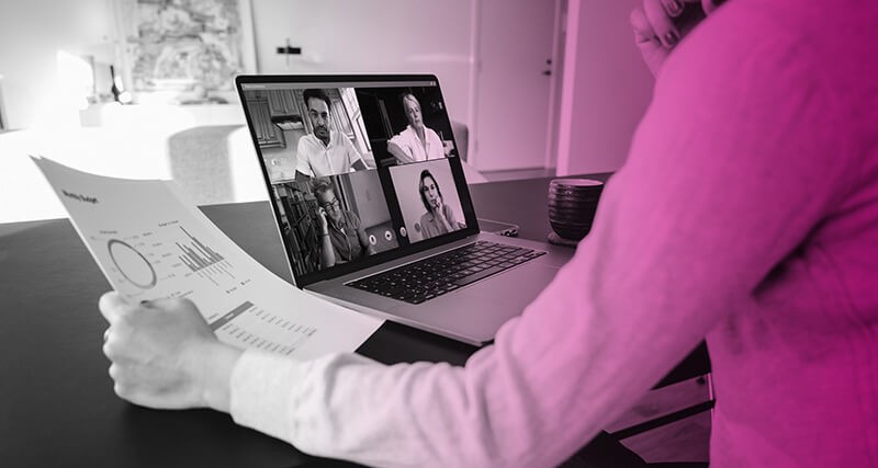 Business professionals have a web conference call.