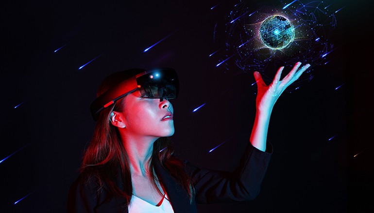 Empowered women in innovate modern technology - Young business girl trying mixed reality with hololens 1 - Virtual and Augmented reality concept