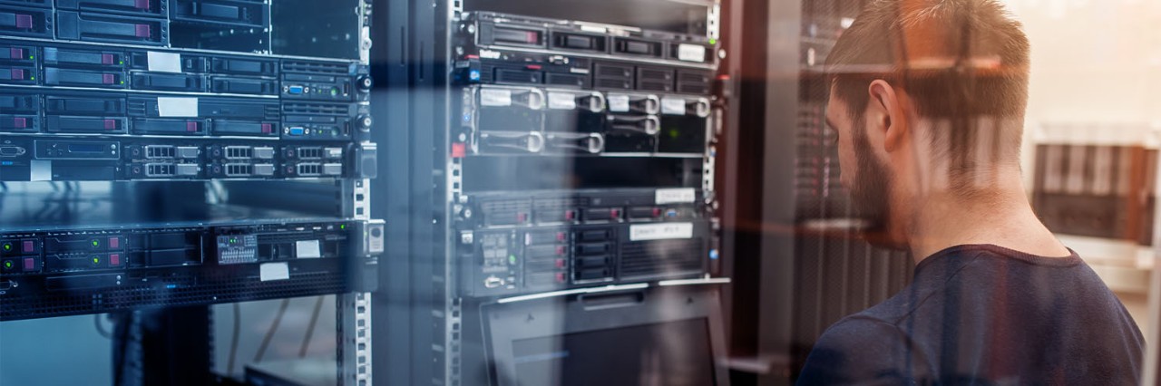 man_in_server_room_banner man_in_server_room_banner