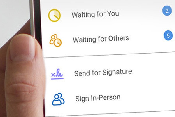Réaménagez votre bureau. Hand holding smart phone with document mgmt solutions displayed.