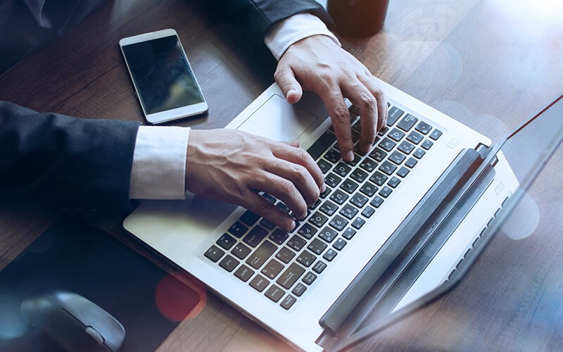 Professional working on laptop