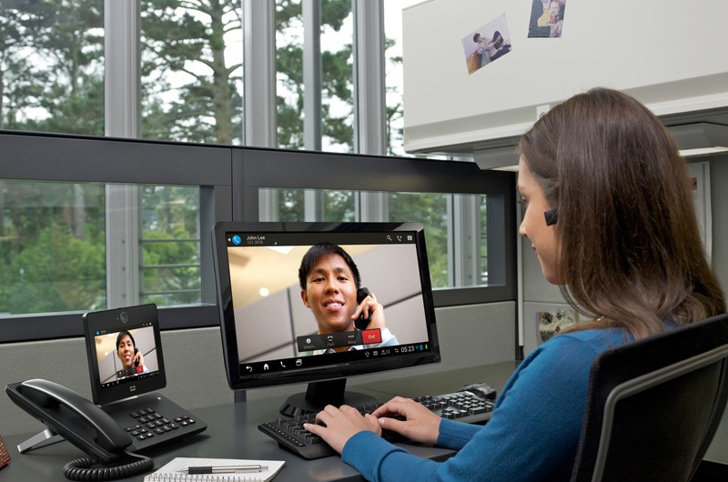 Get proactive tech support. Business woman on video conference with tech support.
