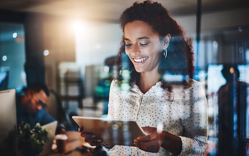 HyperScale is delivered as one simple software package Woman holding tablet device