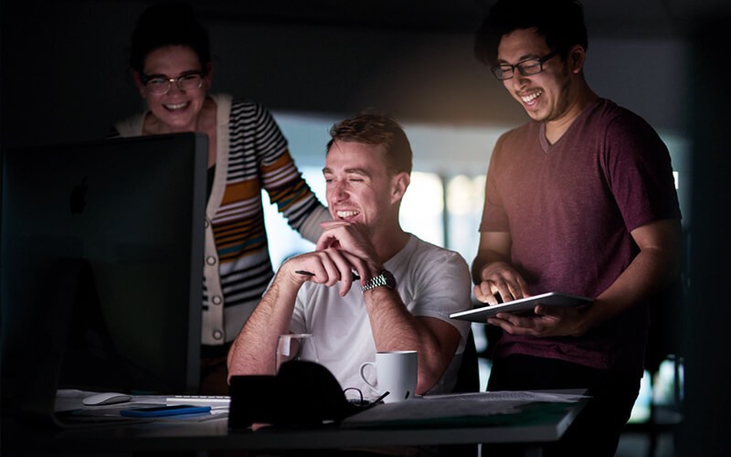 Orchestrate helps your business increase uptime and productivity Three users working together
