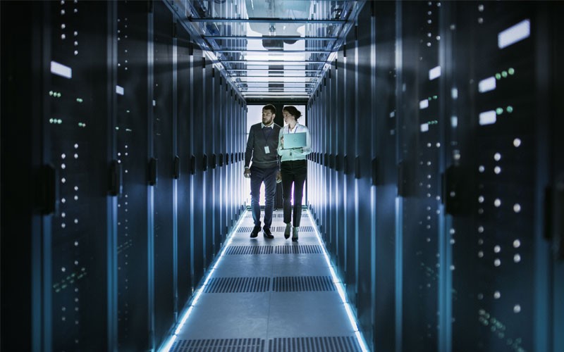 Eaton services Users walking through data center