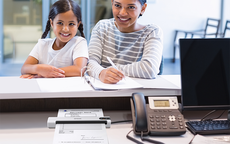 Epson scanner scanning business receipt 