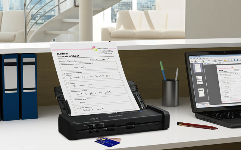 pson scanner, you can digitize the photos and documents that matter most Epson scanner on desk