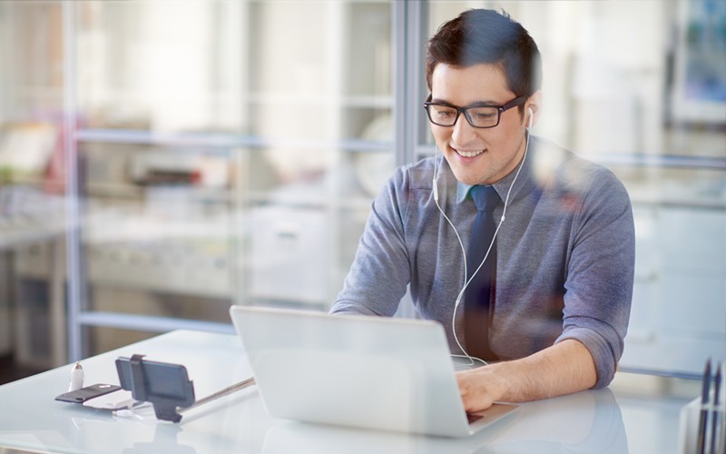 FireEye Email Security Man on laptop