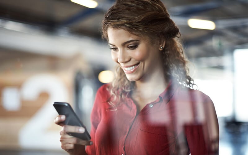 Woman using mobile device Woman using mobile device