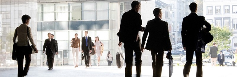 Business professionals walking outside