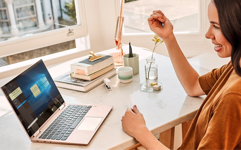 Microsoft Windows 10 Woman using laptop with Microsoft Windows 10