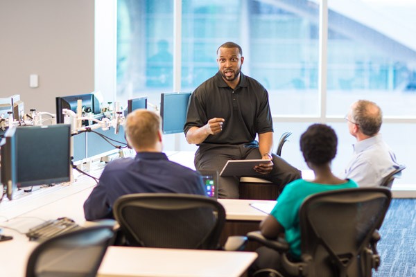 Support of more than 500 security professionals around the world. Team meeting